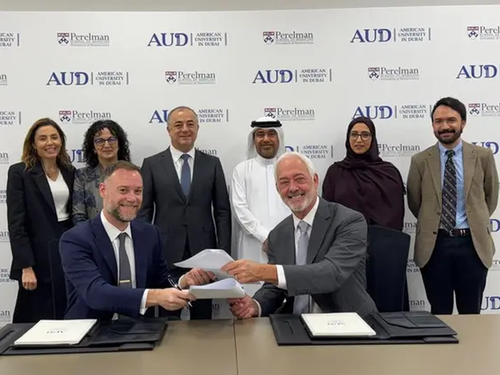 Photo of People signing an MOU